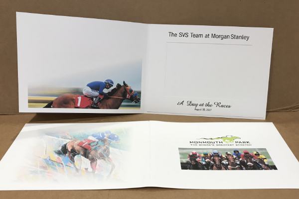 Open photo frame with horse racing images and text on a brown background